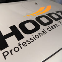 HOODZ commercial cleaning franchise logo on van